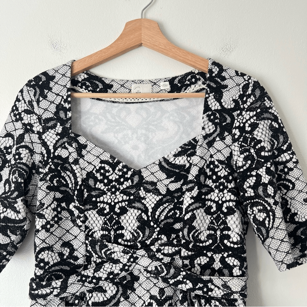 Anthropologie Postmark Leia Peplum Lace Print Top