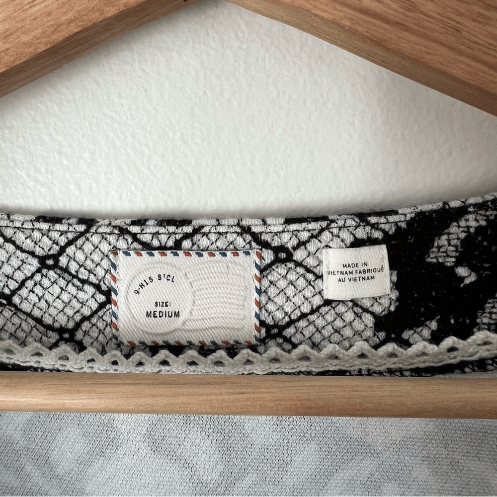 Anthropologie Postmark Leia Peplum Lace Print Top