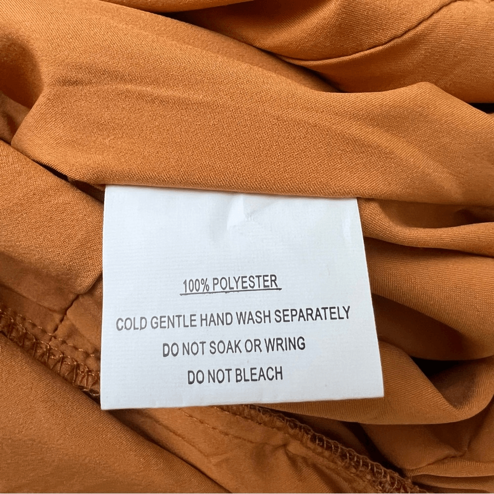 Saints and Secrets NADI V-Neck Wrap Romper Size Small