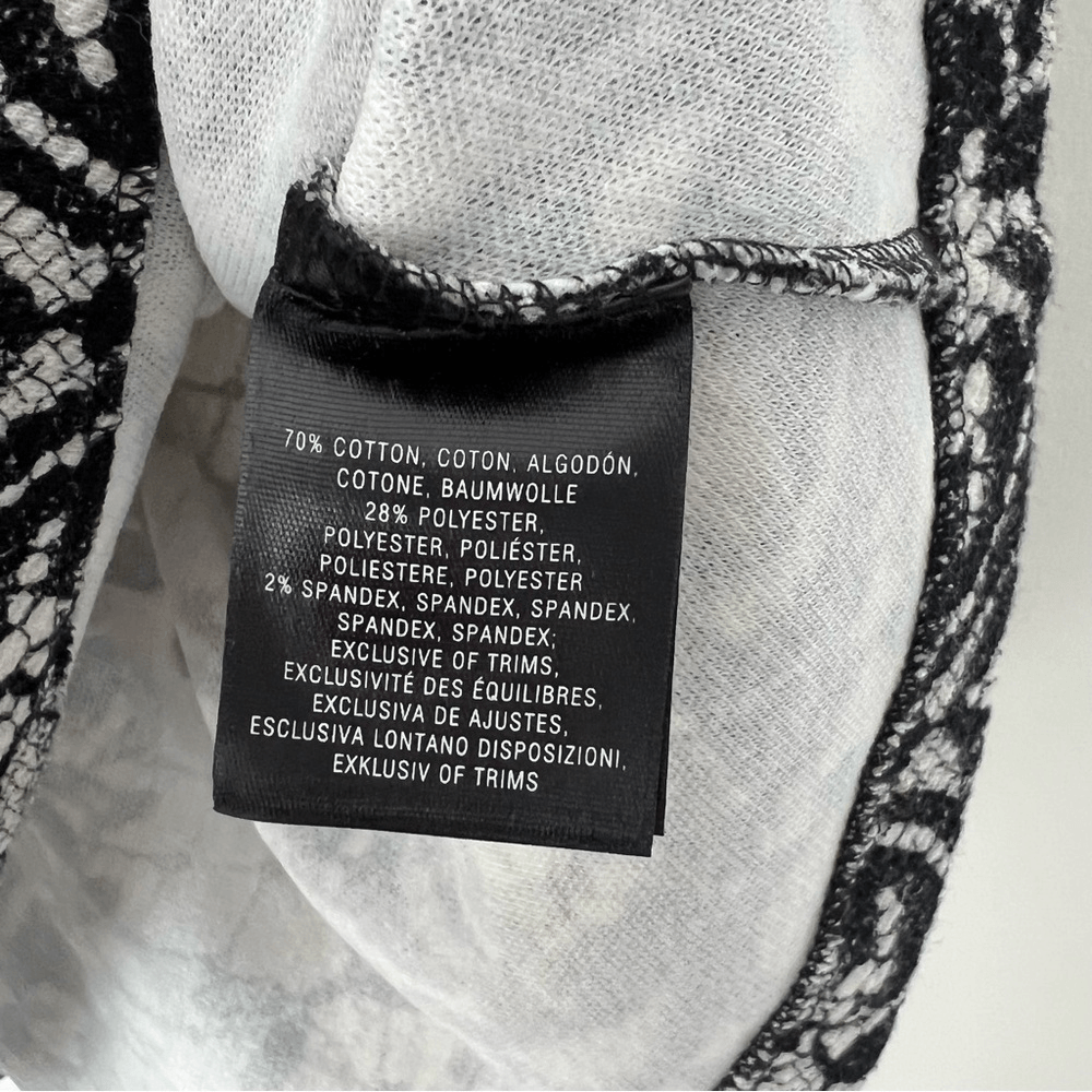 Anthropologie Postmark Leia Peplum Lace Print Top