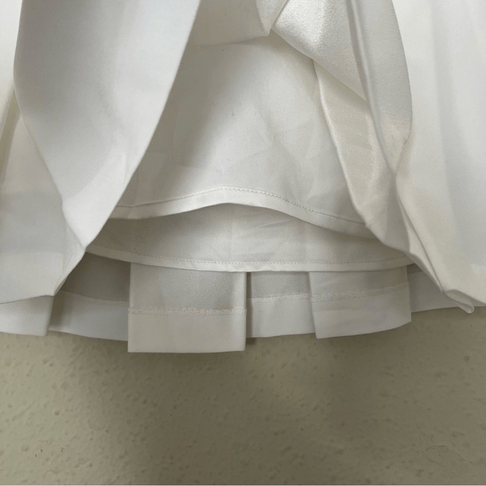 Aritzia Babaton Hathaway Pleated Tennis Skirt in White Size 2