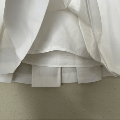 Aritzia Babaton Hathaway Pleated Tennis Skirt in White Size 2