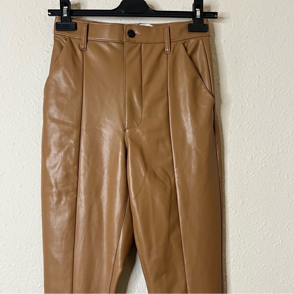 Abercrombie & Fitch “The Skinny Ultra High Rise” Vegan Leather Split-Hem Pant